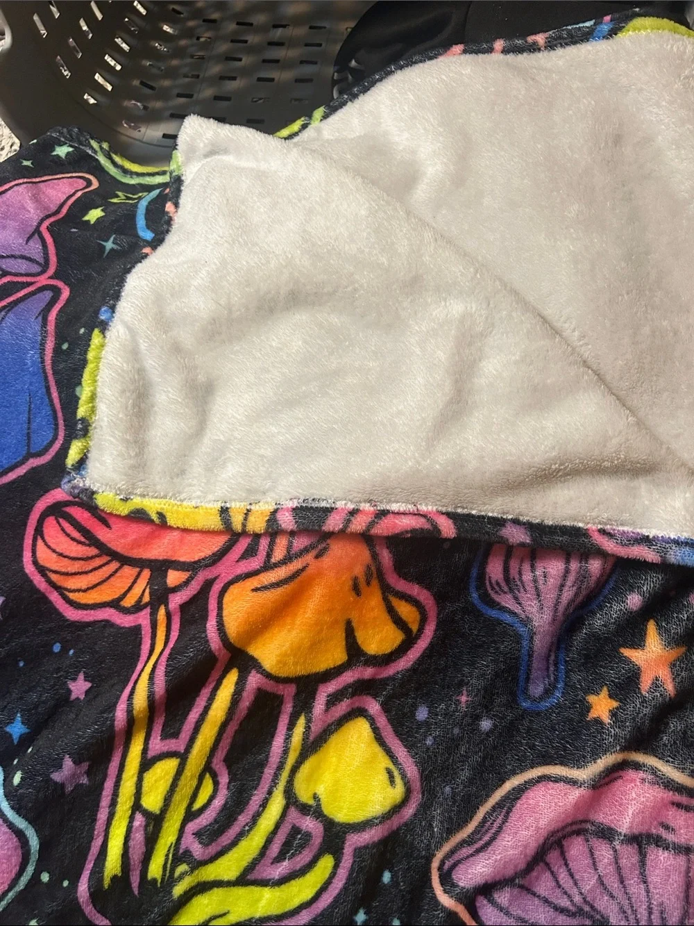 Funky Mushroom-Print Throw Blanket in Neon Colors on Black Background